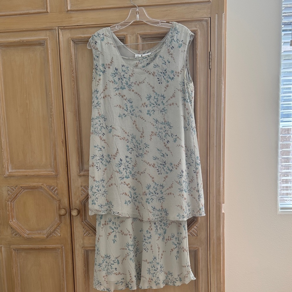 DKNY Blue floral. Top has small clear crystal beads.
